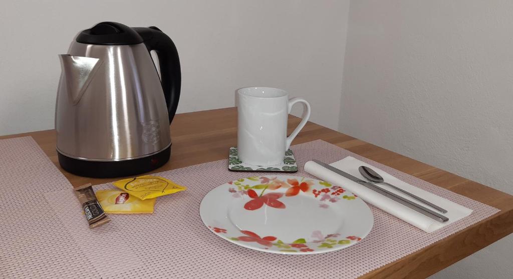 Príslušenstvo na prípravu kávy alebo čaju v ubytovaní Maison Alice