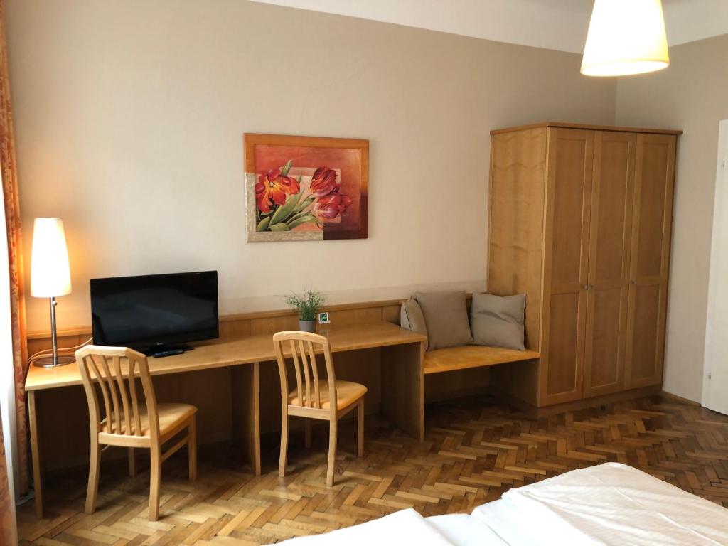 Postel nebo postele na pokoji v ubytování Gasthof Schwabl Wirt