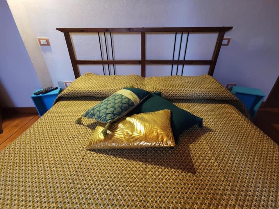 A bed or beds in a room at Agriturismo Mondo