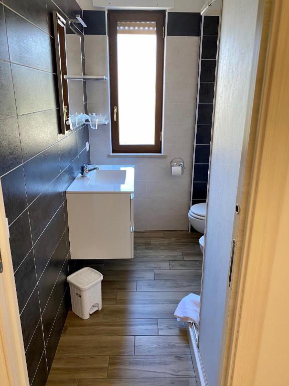 Koupelna v ubytování Caruso Rooms