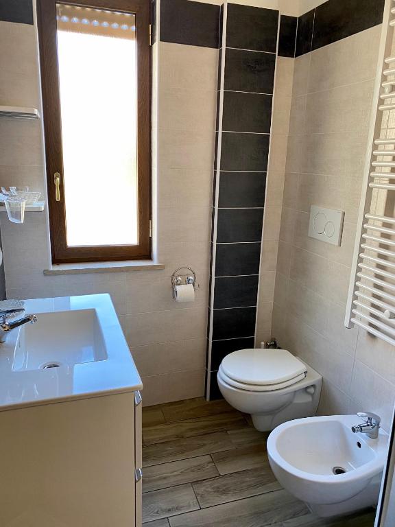 Koupelna v ubytování Caruso Rooms