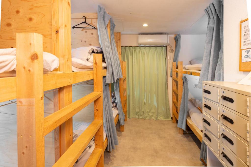 Postel nebo postele na pokoji v ubytování Guesthouse Sensu