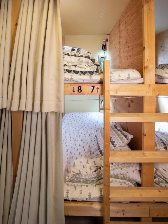 Postel nebo postele na pokoji v ubytování Guesthouse Sensu