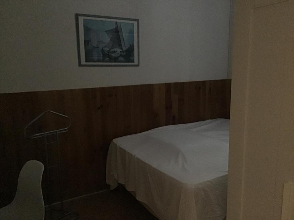 Postel nebo postele na pokoji v ubytování L'ilot Fleuri
