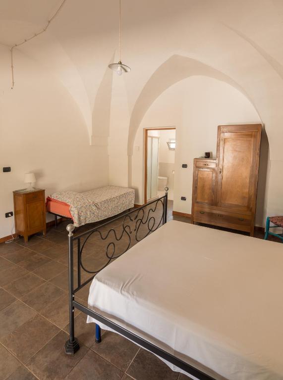 Posteľ alebo postele v izbe v ubytovaní Cottage a 5 minuti dal mare
