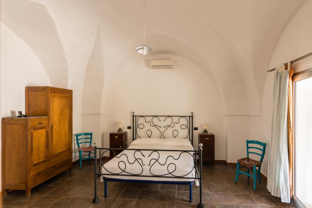 Posteľ alebo postele v izbe v ubytovaní Cottage a 5 minuti dal mare