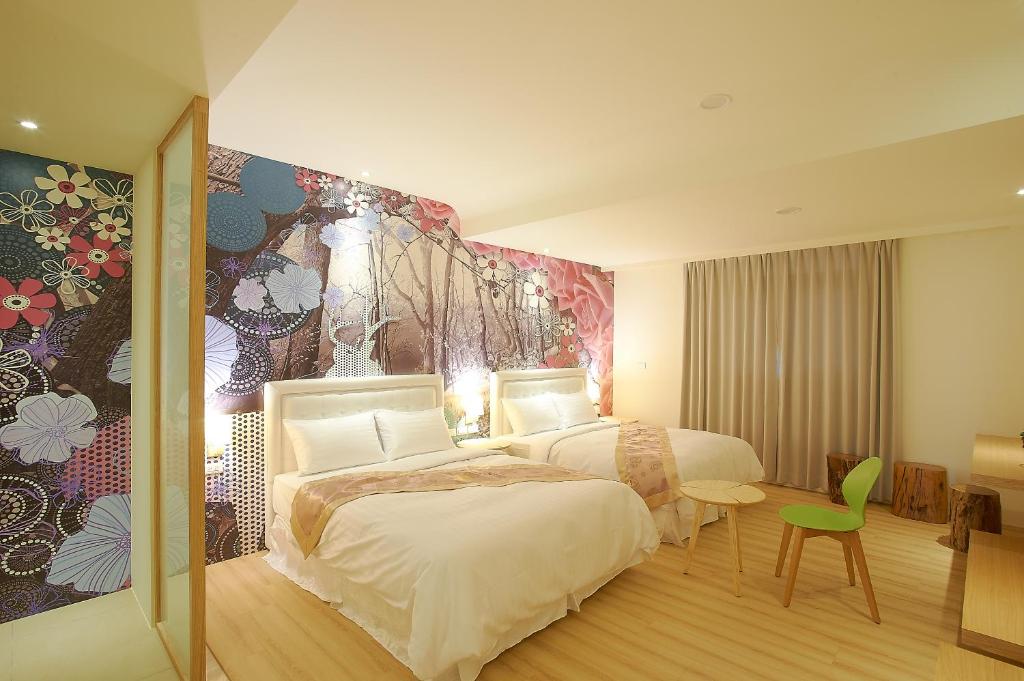 Postel nebo postele na pokoji v ubytování 大鵬灣瞭望台 Top Bay B&B