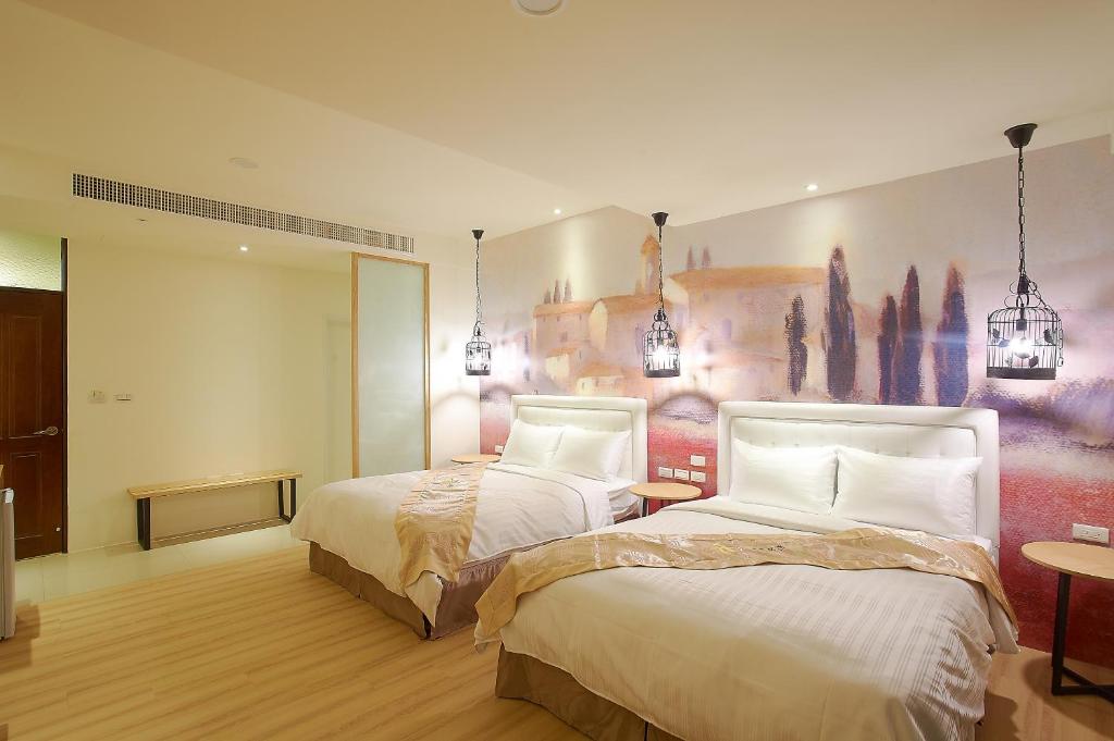 Postel nebo postele na pokoji v ubytování 大鵬灣瞭望台 Top Bay B&B