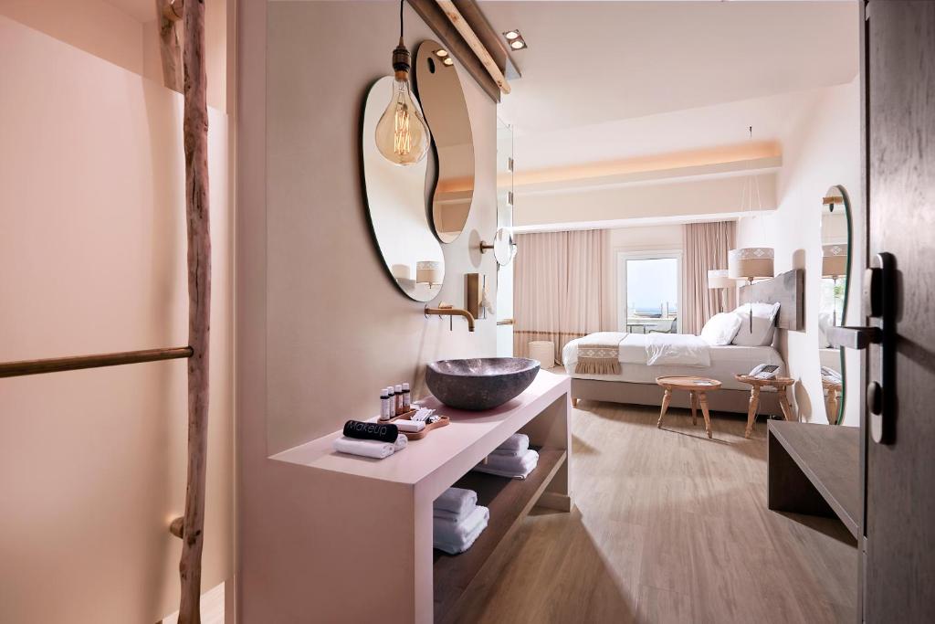 Postel nebo postele na pokoji v ubytování Palladium Hotel