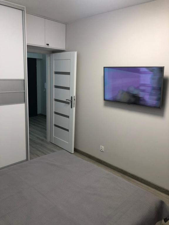 Postel nebo postele na pokoji v ubytování Apartament Agnes Szczecin Pomorzany