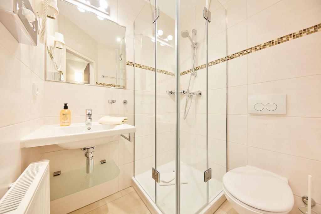 Koupelna v ubytování Hotel garni Sonnenhof
