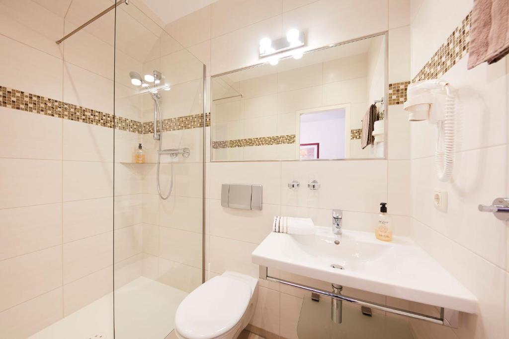 Koupelna v ubytování Hotel garni Sonnenhof