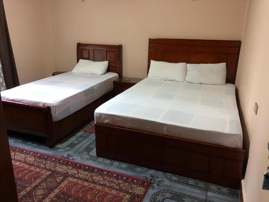 Postel nebo postele na pokoji v ubytování Caesar House