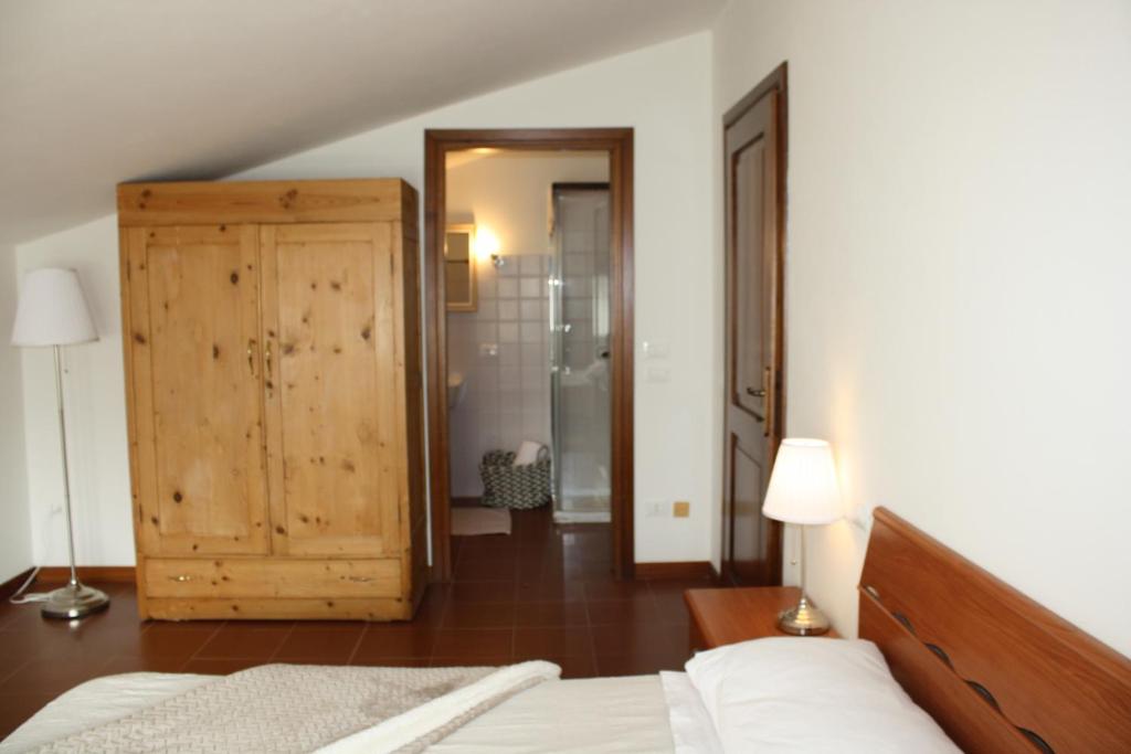 Ein Bett oder Betten in einem Zimmer der Unterkunft VILLA COLLE