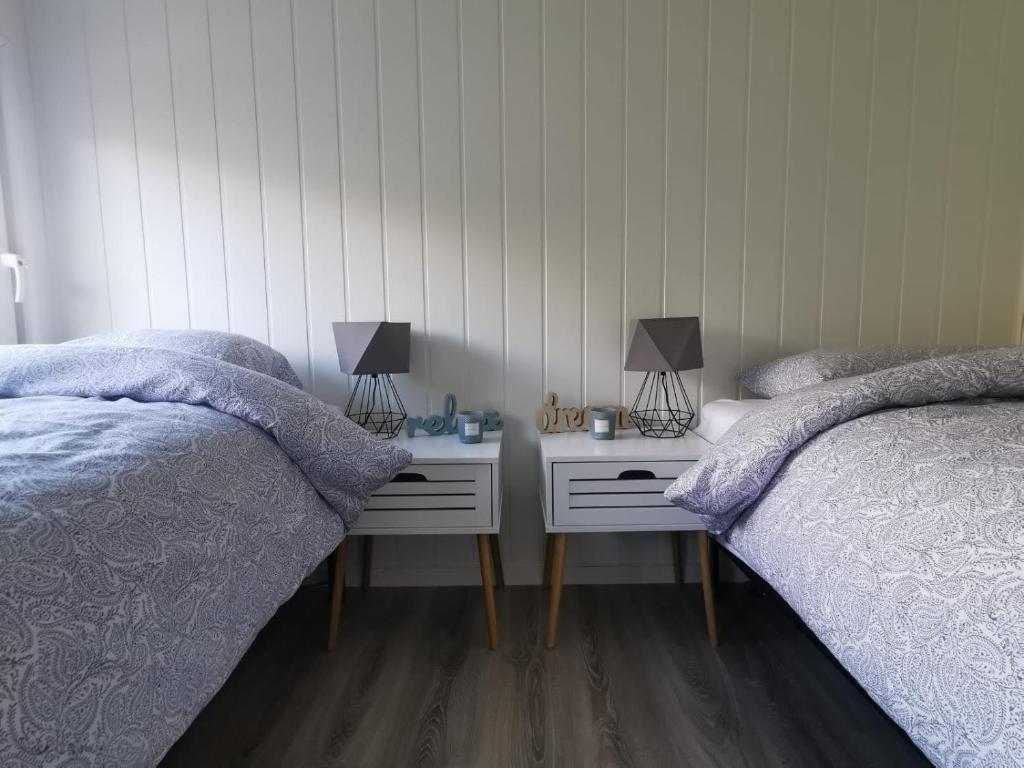 Postel nebo postele na pokoji v ubytování Waterfront Senja