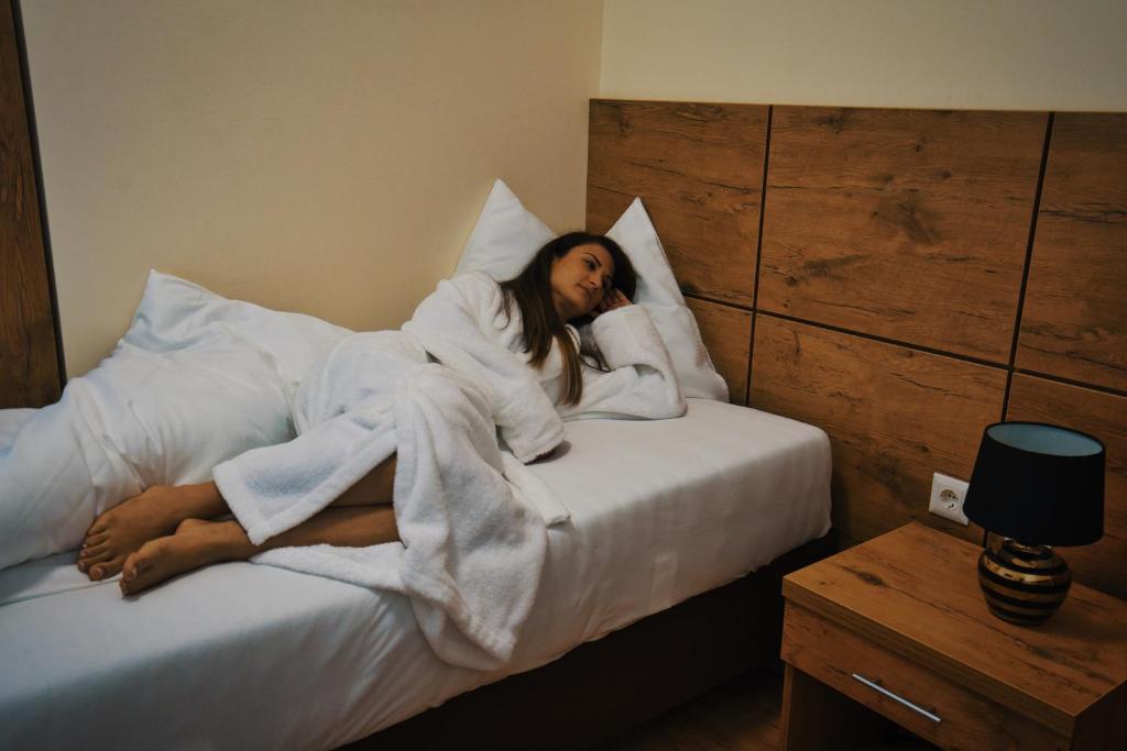 Posteľ alebo postele v izbe v ubytovaní M-24 Apartments