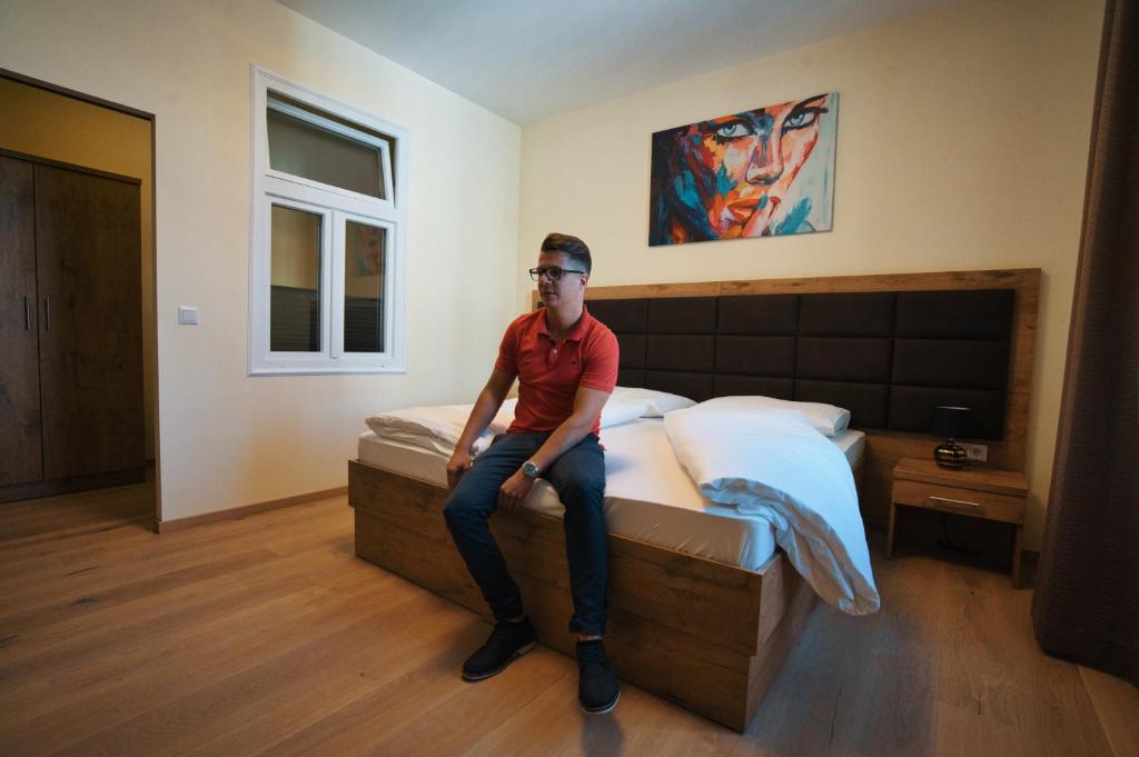 Posteľ alebo postele v izbe v ubytovaní M-24 Apartments