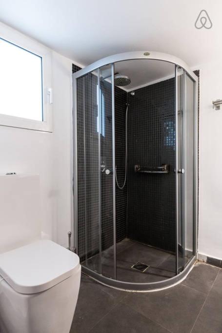A bathroom at Myron Apartments