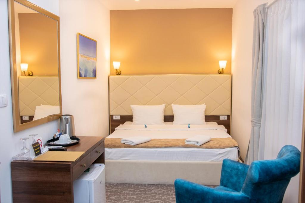 Postel nebo postele na pokoji v ubytování Luxury Rooms Skadarlija