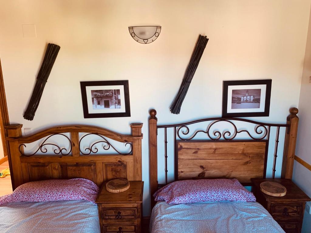 Postel nebo postele na pokoji v ubytování Casa Román II