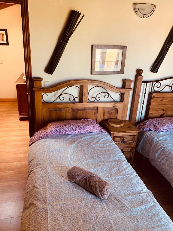 Postel nebo postele na pokoji v ubytování Casa Román II
