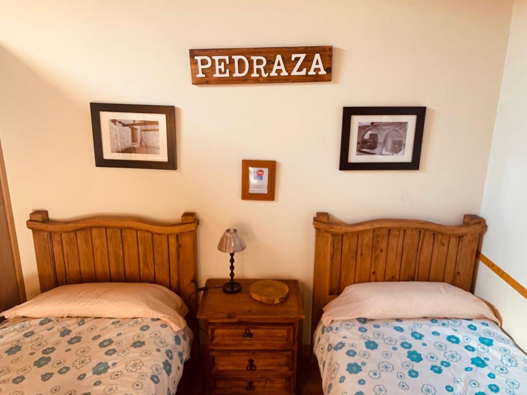 Postel nebo postele na pokoji v ubytování Casa Román II