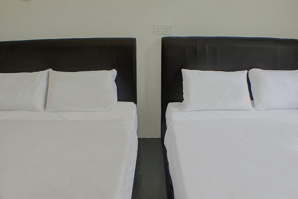 Postel nebo postele na pokoji v ubytování I Hotel