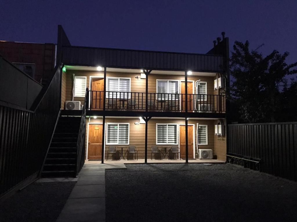 a house with a staircase in front of it at night at Departamentos Santa Bárbara in Osorno