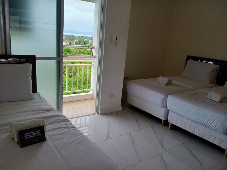 Postel nebo postele na pokoji v ubytování Centtro Residences