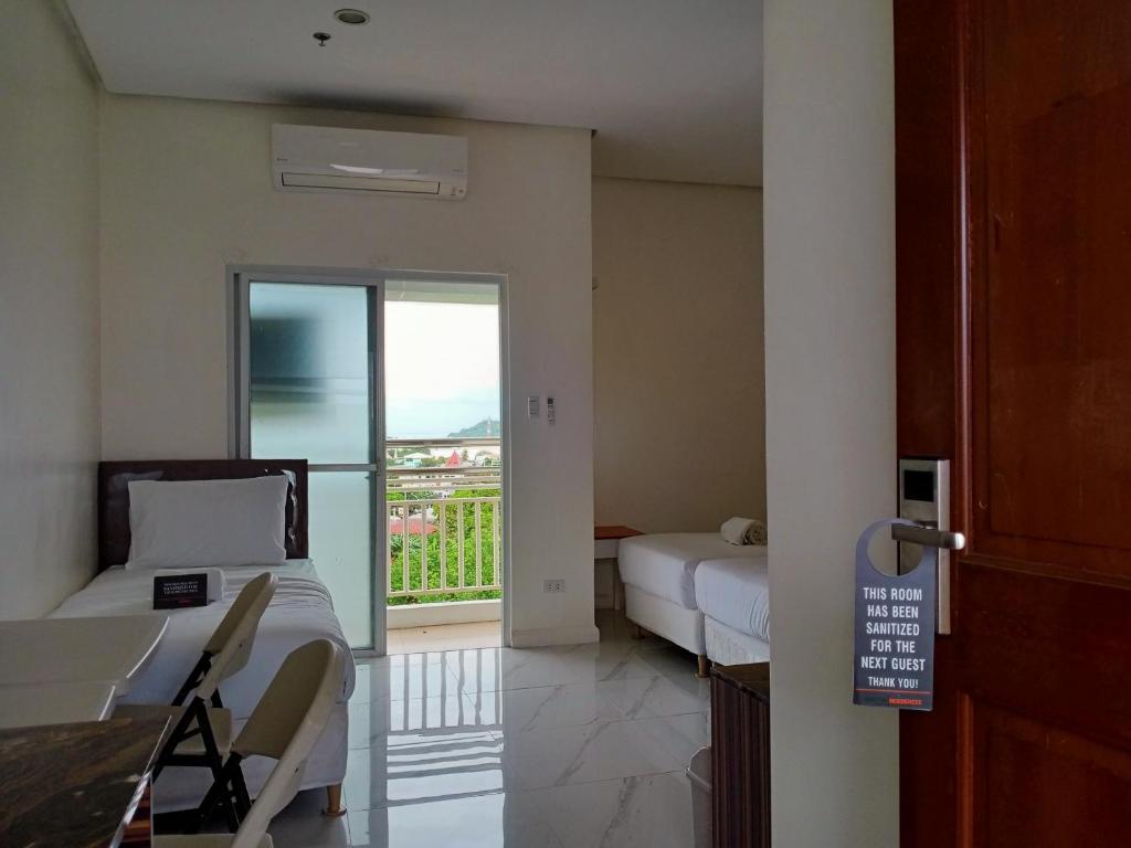 Postel nebo postele na pokoji v ubytování Centtro Residences