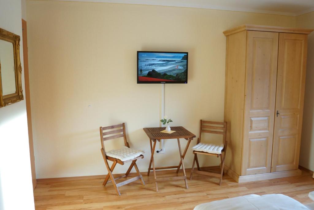 TV a/nebo společenská místnost v ubytování Chalet Olympia