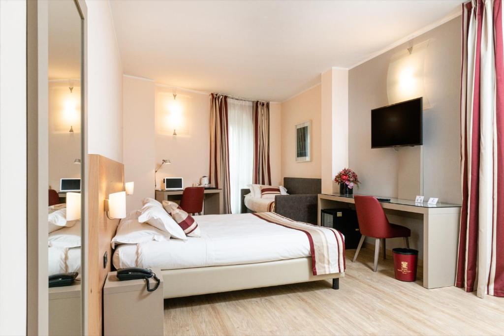 TV a/nebo společenská místnost v ubytování Hotel Royal Falcone