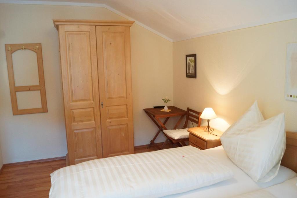 Postel nebo postele na pokoji v ubytování Chalet Olympia