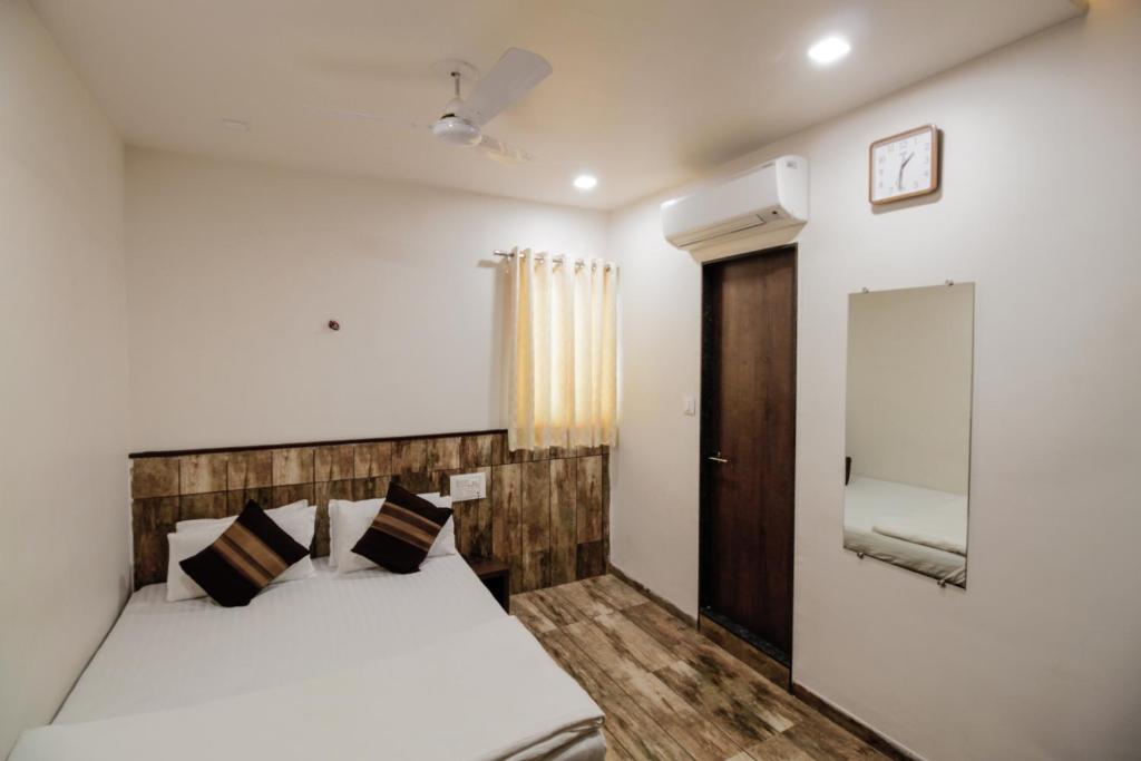 Postel nebo postele na pokoji v ubytování Hotel City Inn