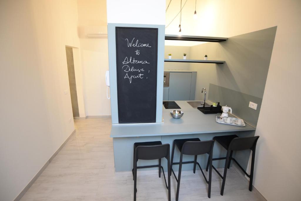 Kuchnia lub aneks kuchenny w obiekcie Altana Deluxe Apart