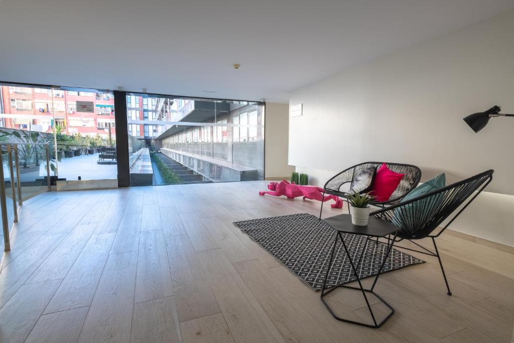 Posezení v ubytování Aparthotel Bcn Montjuic