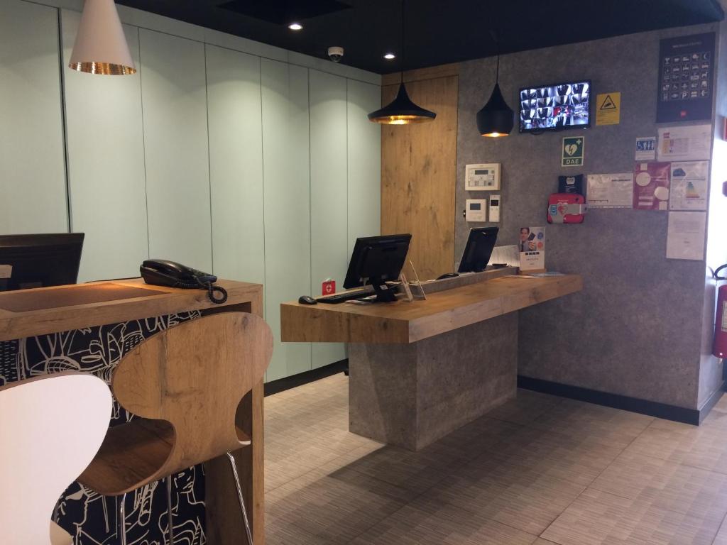 TV a/nebo společenská místnost v ubytování Hotel ibis Braga