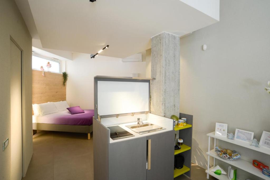 Łóżko lub łóżka w pokoju w obiekcie Exclusive Loft Salerno Centro