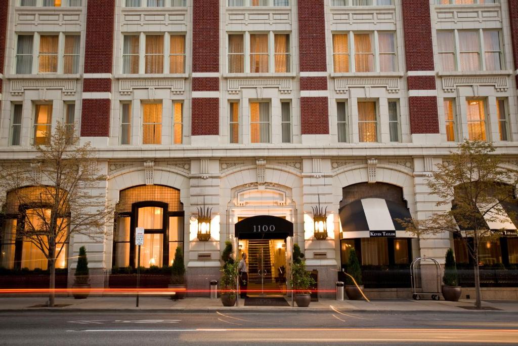 a large building with a hotel sign on it at Hotel Teatro in Denver