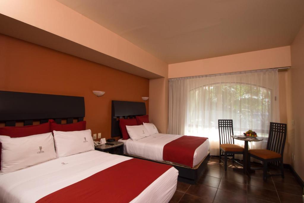 Postel nebo postele na pokoji v ubytování Hotel Celta