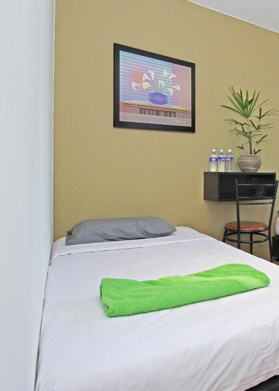 Postel nebo postele na pokoji v ubytování Dream City