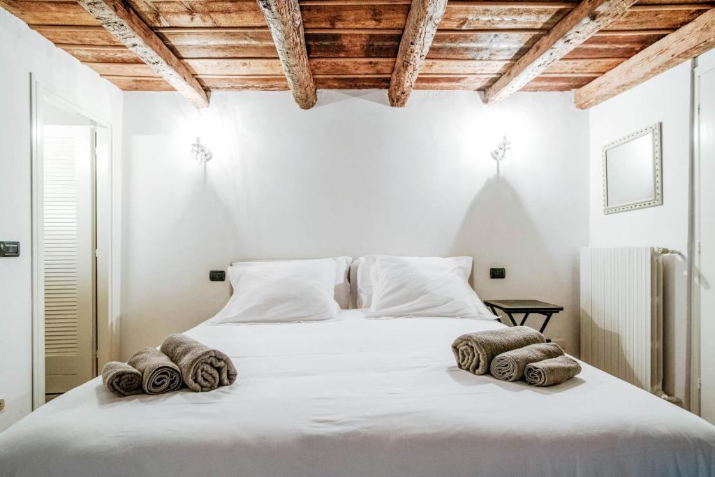 Posteľ alebo postele v izbe v ubytovaní House Of Dreams