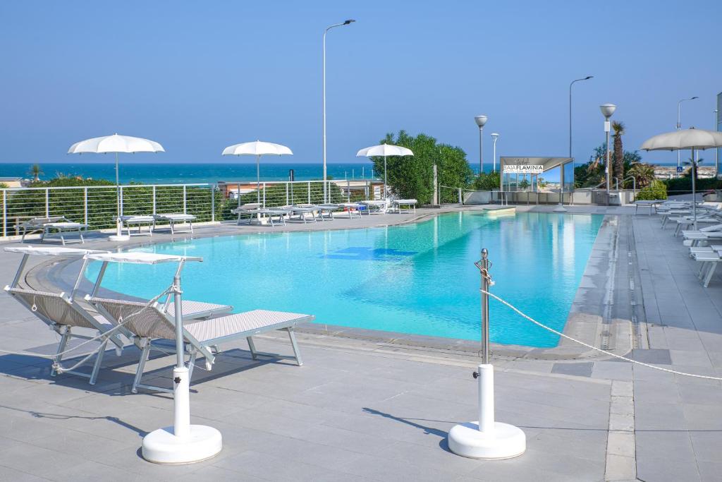 Bazén v ubytování Hotel Baia Flaminia nebo v jeho okolí