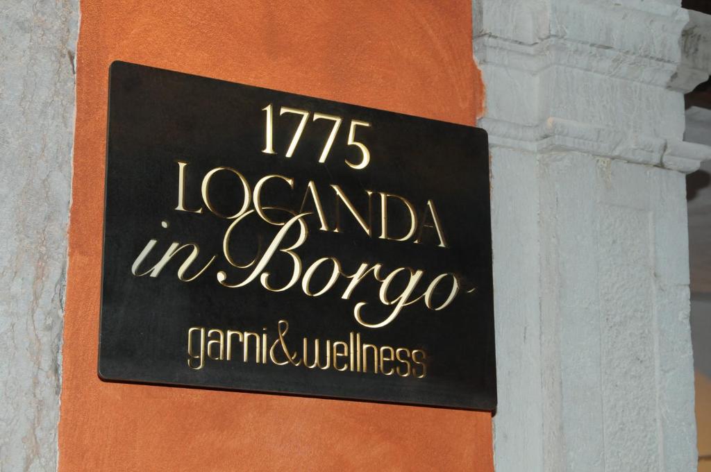 Certifikát, hodnocení, plakát nebo jiný dokument vystavený v ubytování Locanda In Borgo Garnì & Wellness