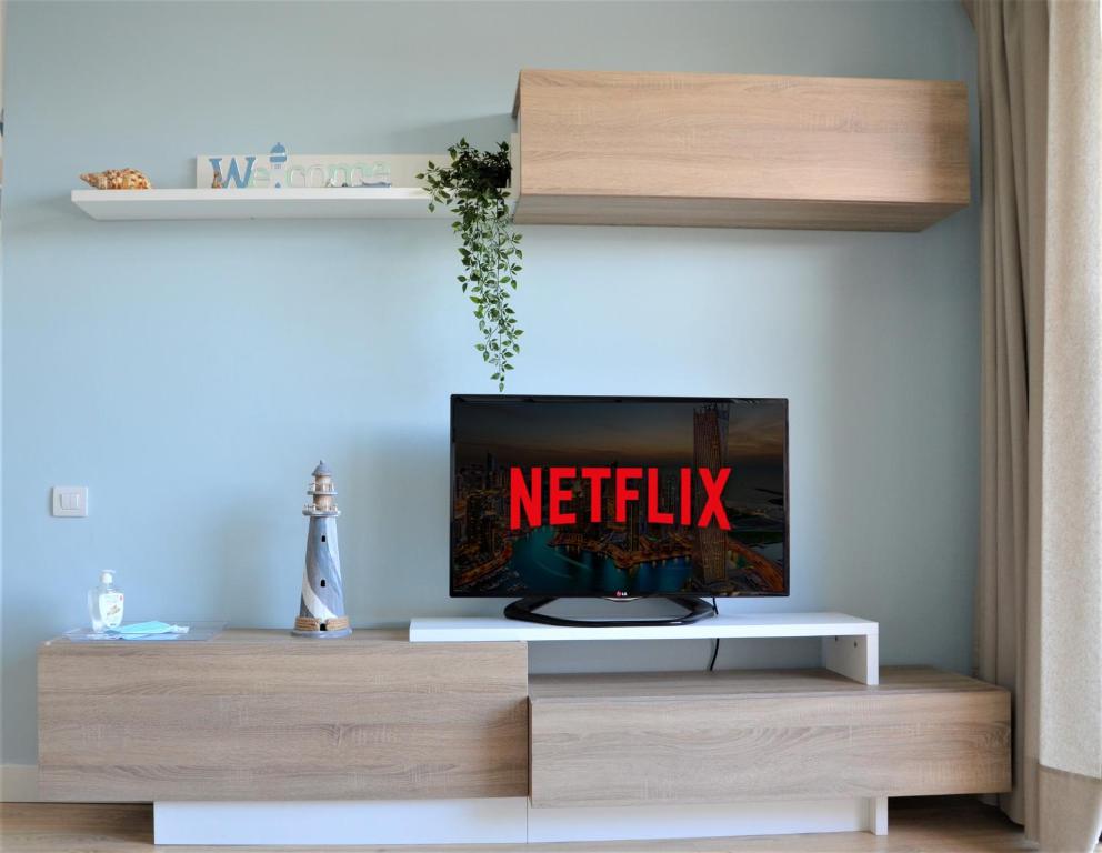 TV a/nebo společenská místnost v ubytování El Alisio Beach