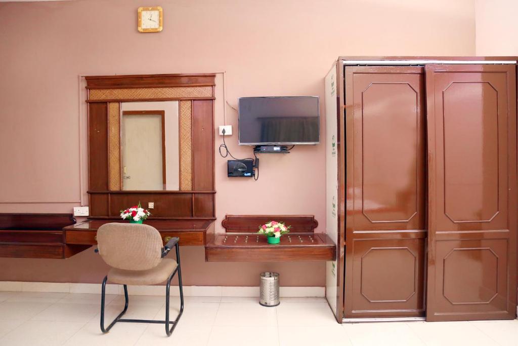 TV a/nebo společenská místnost v ubytování DAFFODILS SERVICED APARTMENT
