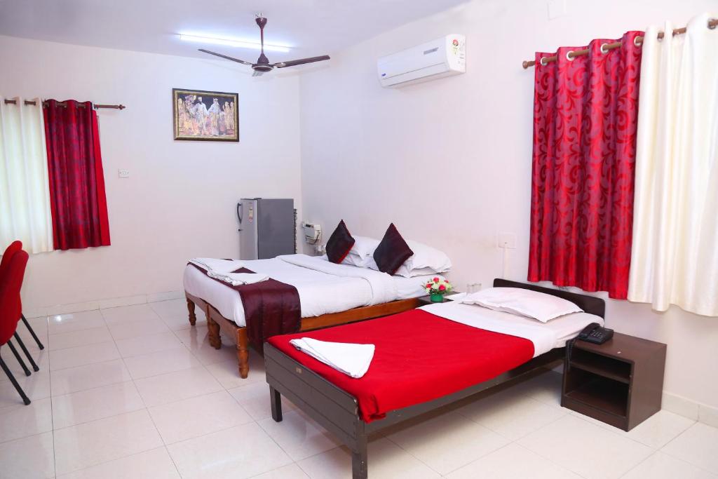 Postel nebo postele na pokoji v ubytování DAFFODILS SERVICED APARTMENT