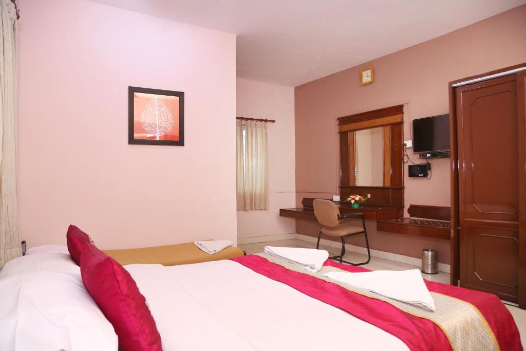 Postel nebo postele na pokoji v ubytování DAFFODILS SERVICED APARTMENT