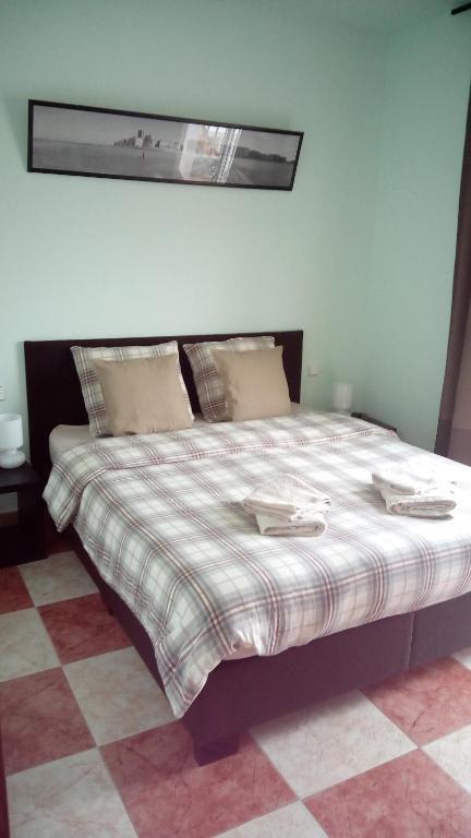 Posteľ alebo postele v izbe v ubytovaní B&B Casa AriGiLi