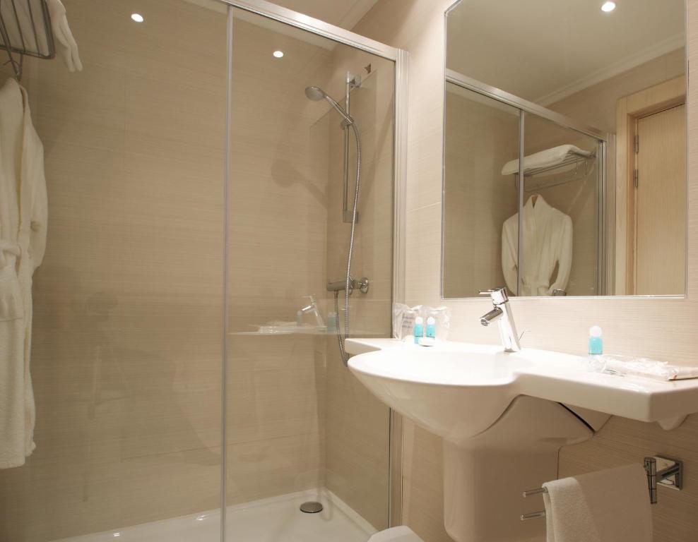 Koupelna v ubytování Hotel Mozart